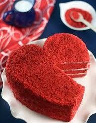 Red Velvet Heart Cake - Heart-shaped cake symbolizing love, with moist red velvet layers and cream cheese frosting, perfect for special occasions