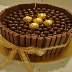 Kit Kat Chocolate Rocher Cake - Moist chocolate cake surrounded by Kit Kat border and adorned with Rocher chocolates, perfect for any celebration