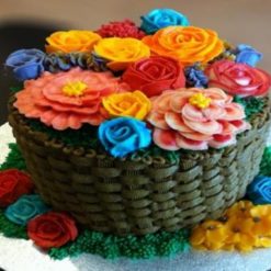 Chocolate Truffle Basket with Flowers - Moist chocolate cake adorned with luscious truffle filling and vibrant floral decorations, perfect for any celebration