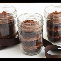 Chocolate Cake in a Jar - Layers of moist chocolate cake, chocolate ganache, and chocolate shavings, perfect for gifting or personal indulgence