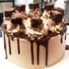 Decadent Chocolate Brownie Cake - Moist chocolate cake infused with brownie goodness, perfect for any celebration