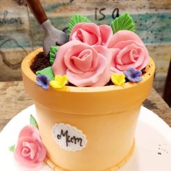 Love For Gardening Theme Designer Cake - Garden-themed cake with fondant decorations