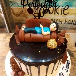 Customized Men’s Theme Based Designer Cake with intricate decorations and personalized theme