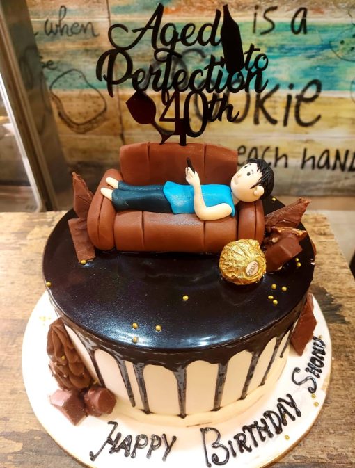 Customized Men’s Theme Based Designer Cake with intricate decorations and personalized theme